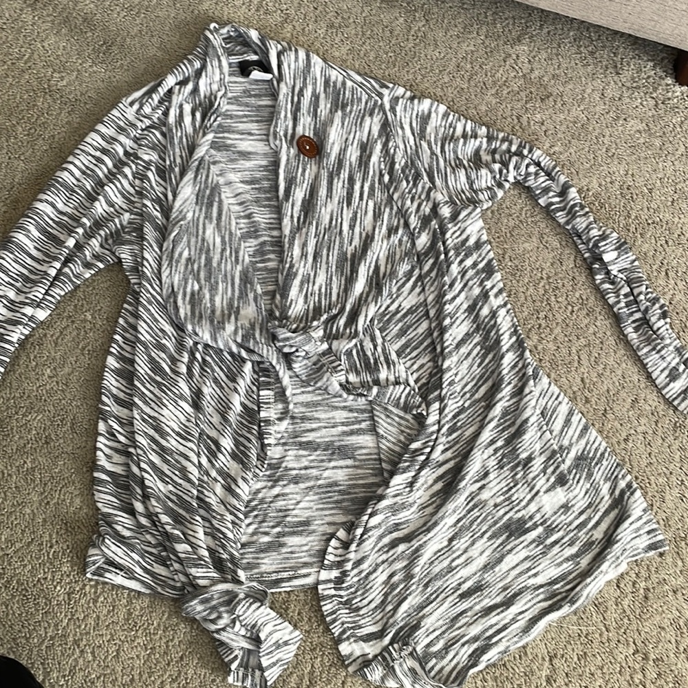 Black and white sweater size medium.